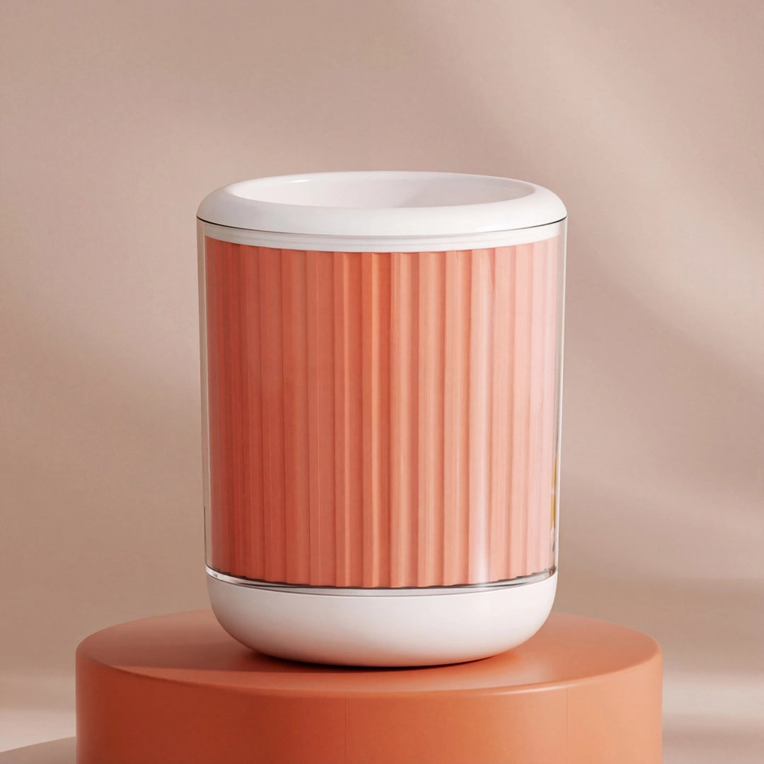 Light orange cylindrical pet paw cleaner with ribbed texture on a peach-colored background